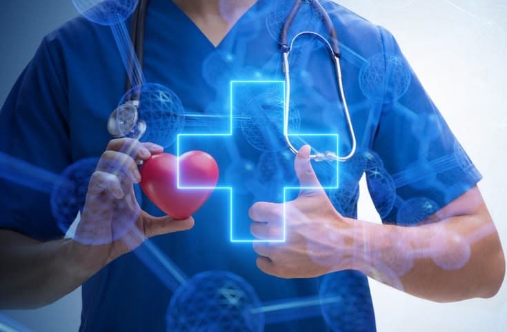 A clinician reviewing a scan